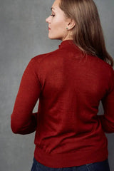 A back view of the Gaby Woman Cardigan Qiviuk in Red made by Qiviuk Boutique