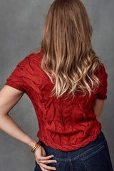 A back view of a red Chani Woman Pullover Petite sweater made of  Qiviuk, Merino & Silk in red by Qiviuk Boutique